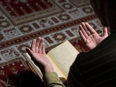 Muslim Man Is Reading The Koran