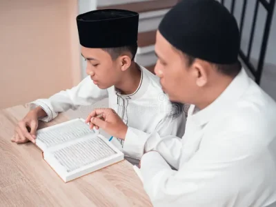 portrait-muslim-father-teaching-his-son-how-to-read-quran-muslim-father-teaching-his-son-how-to-read-quran-148398006